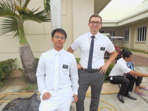 Elder Tyler Burbidge with his companion, Elder Tumanguil, prior to a baptism.
